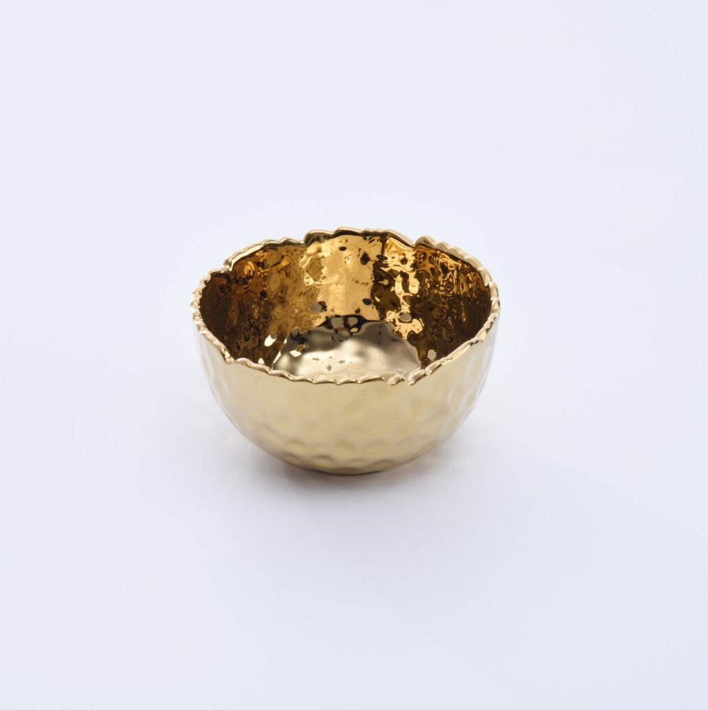 Gold decorative bowl on a white background