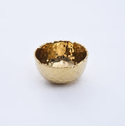 Gold decorative bowl on a white background