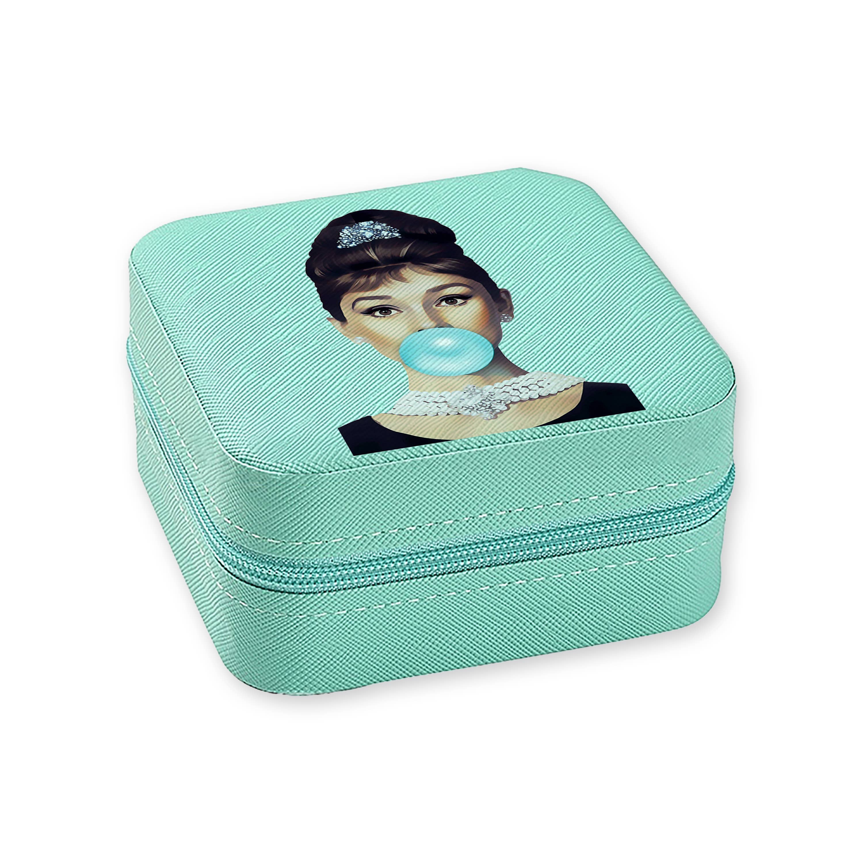 Toss designs Brand Teal jewelry box with a graphic of Audrey Hepburn on the lid