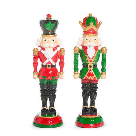 red and green resin nutcracker by RAZ Imports on a white background