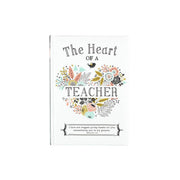 Book titled 'The Heart of a Teacher' with floral design on a white background