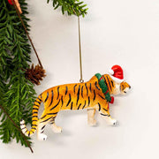 tiger ornament hanging on tree branch 