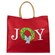 Red tote bag with 'JOY' and Christmas wreath design on a white background