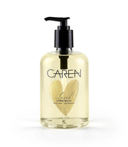 Bottle of Caren Lavish Hand Wash with a heart design on a white background