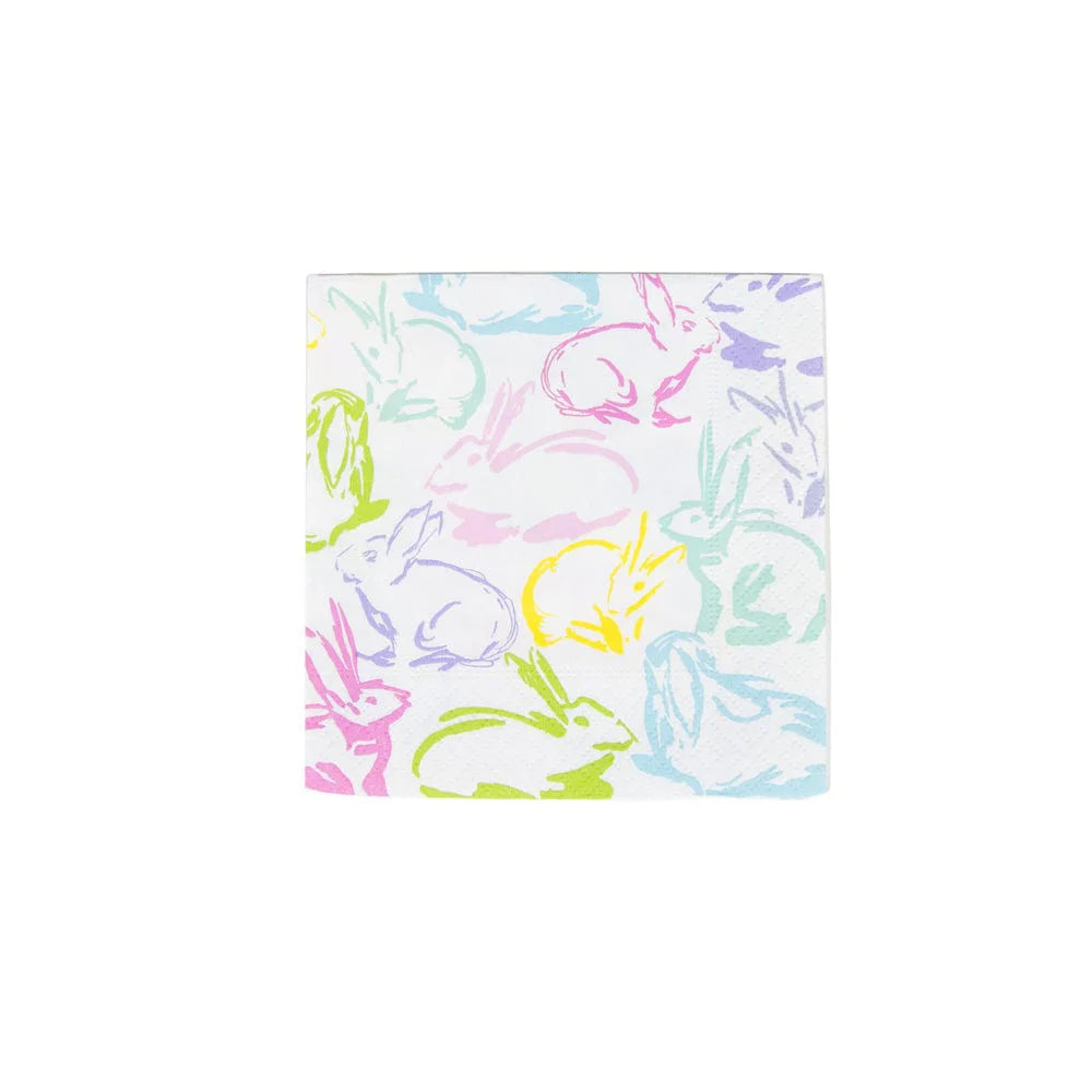 Patterned napkin with colorful rabbit illustrations on a white background