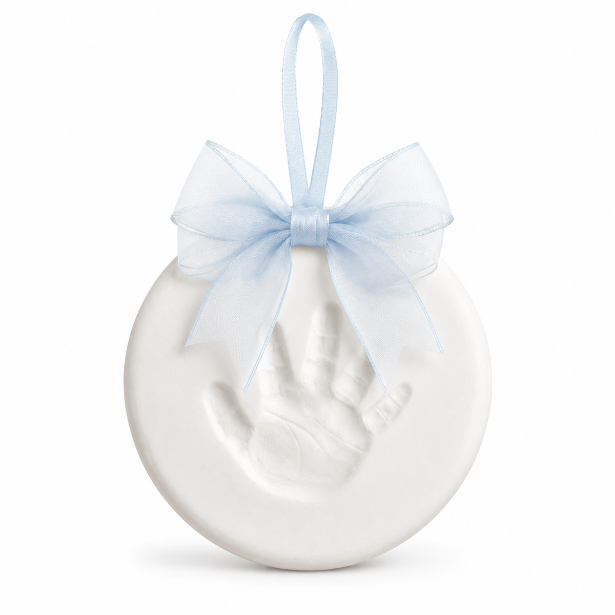 A white circular keepsake ornament featuring an embossed baby handprint, decorated with a light blue sheer ribbon bow and hanging loop, shown on a clean white background.