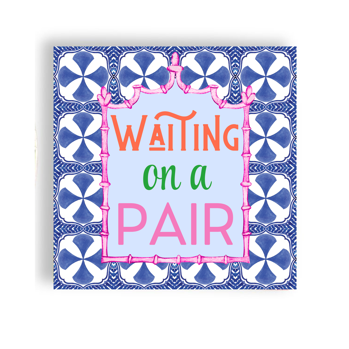 A cocktail napkin that says 'WAITING on a PAIR' in orange, green, and pink lettering on a pale blue center, surrounded by a pink bamboo-style border and a blue-and-white patterned tile-like frame, shown on a white background.