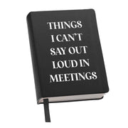 Toss designs brand Black "Things I Can't Say Out Loud In Meetings" Journal Notebook with white text on a white background