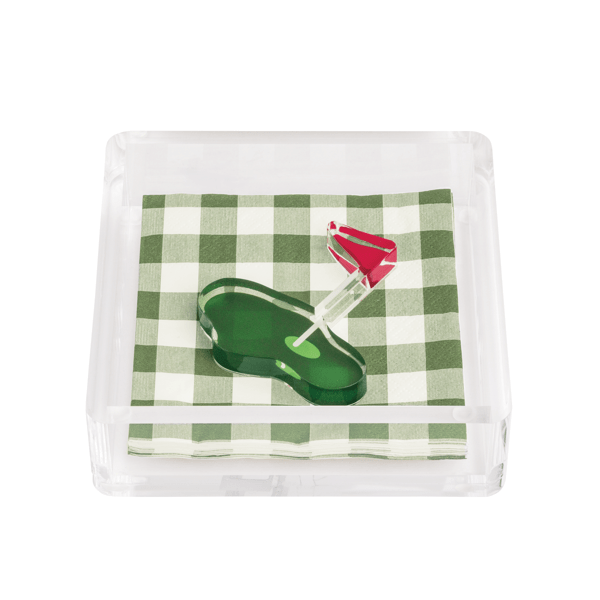 Golf napkin weight on checkered napkin