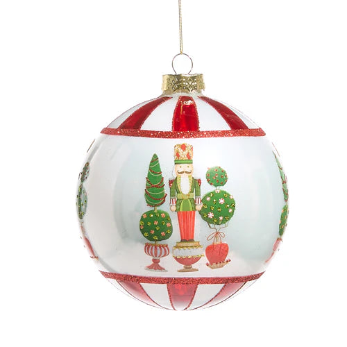 Ball ornament with nutcracker and topiary