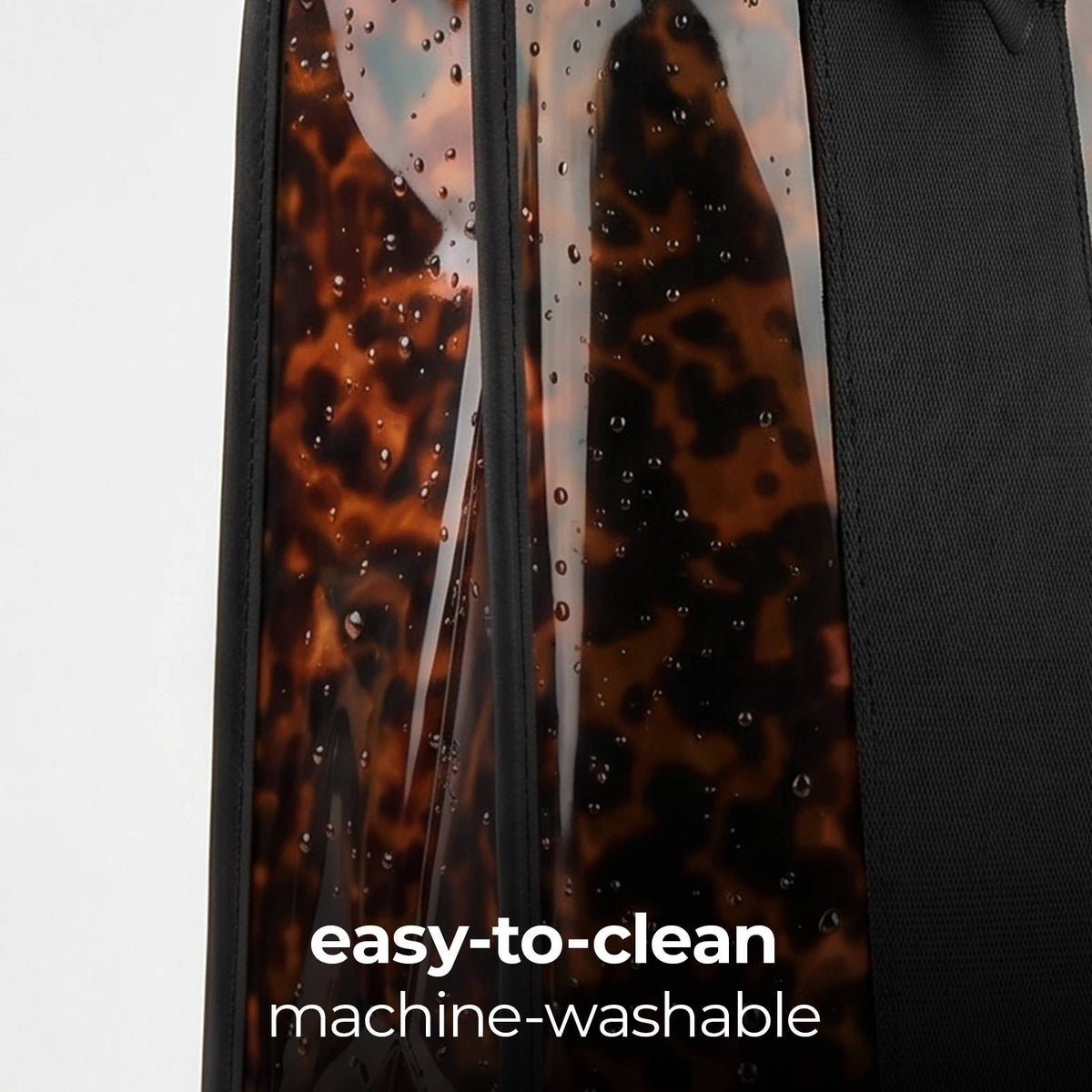Tortoiseshell-patterned product with 'easy-to-clean' and 'machine-washable' text on a gray background
