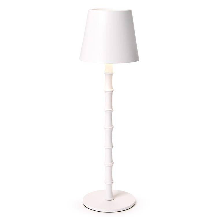 White floor lamp with a white shade on a white background