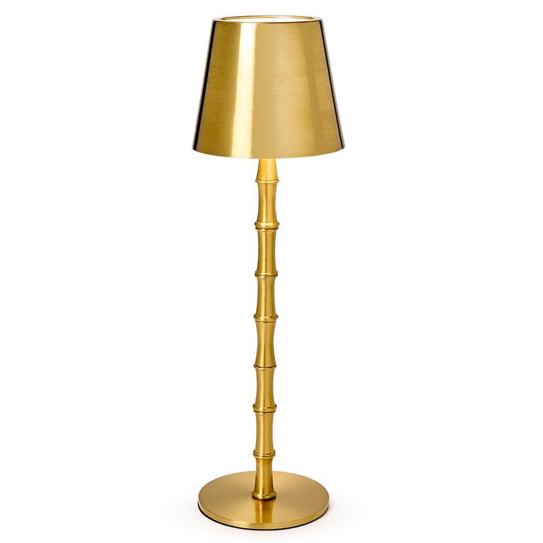 Gold floor lamp with a bamboo-style base on a white background