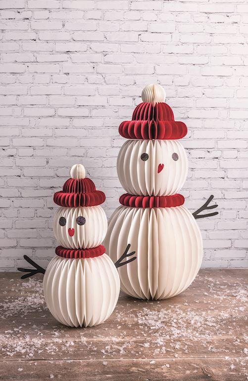 Seasonal - Snowman Sitter - Large paper snowman with a white background and also shows the other sized version.  White brick background 