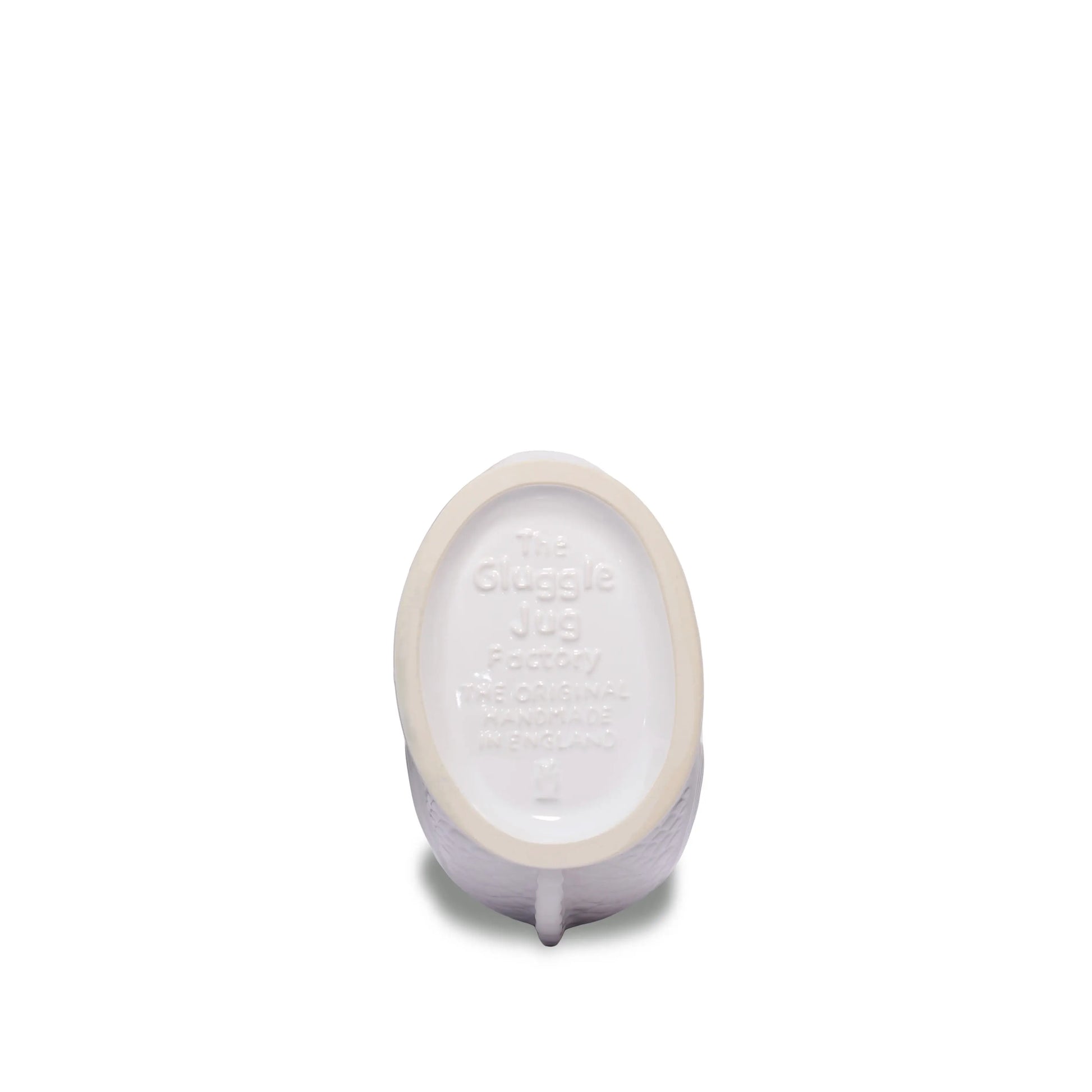 The Original Gluggle Jug Factory base stamp reading The Original Handmade in England on white ceramic fish pitcher
