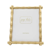 Gold bamboo frame with 'jayes studio' branding on a white background