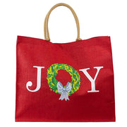 Red tote bag with 'JOY' and Christmas wreath design on a white background