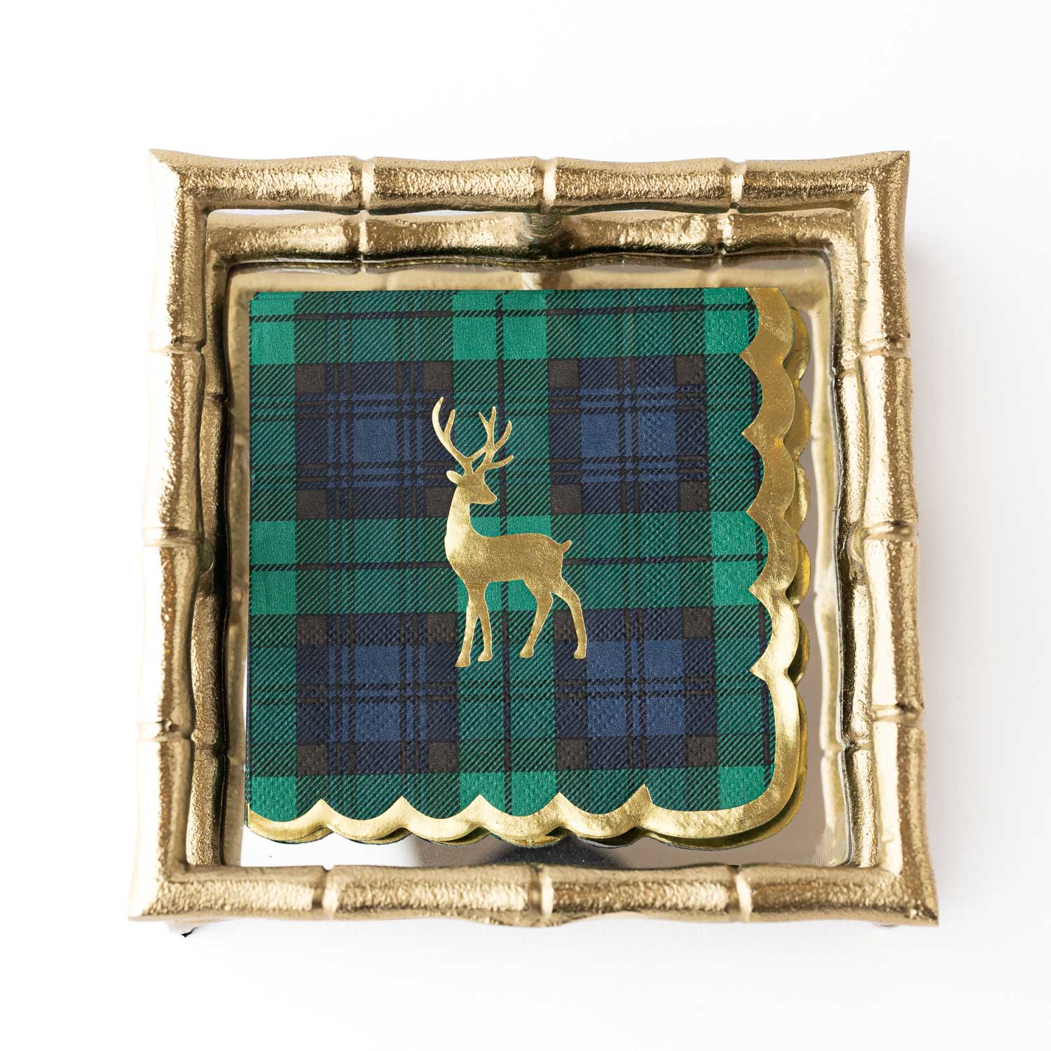  Oak Lane brand Green and blue tartan plaid cocktail napkins with gold scalloped edges and a gold deer design stacked in a god bamboo napkin holder on a white background