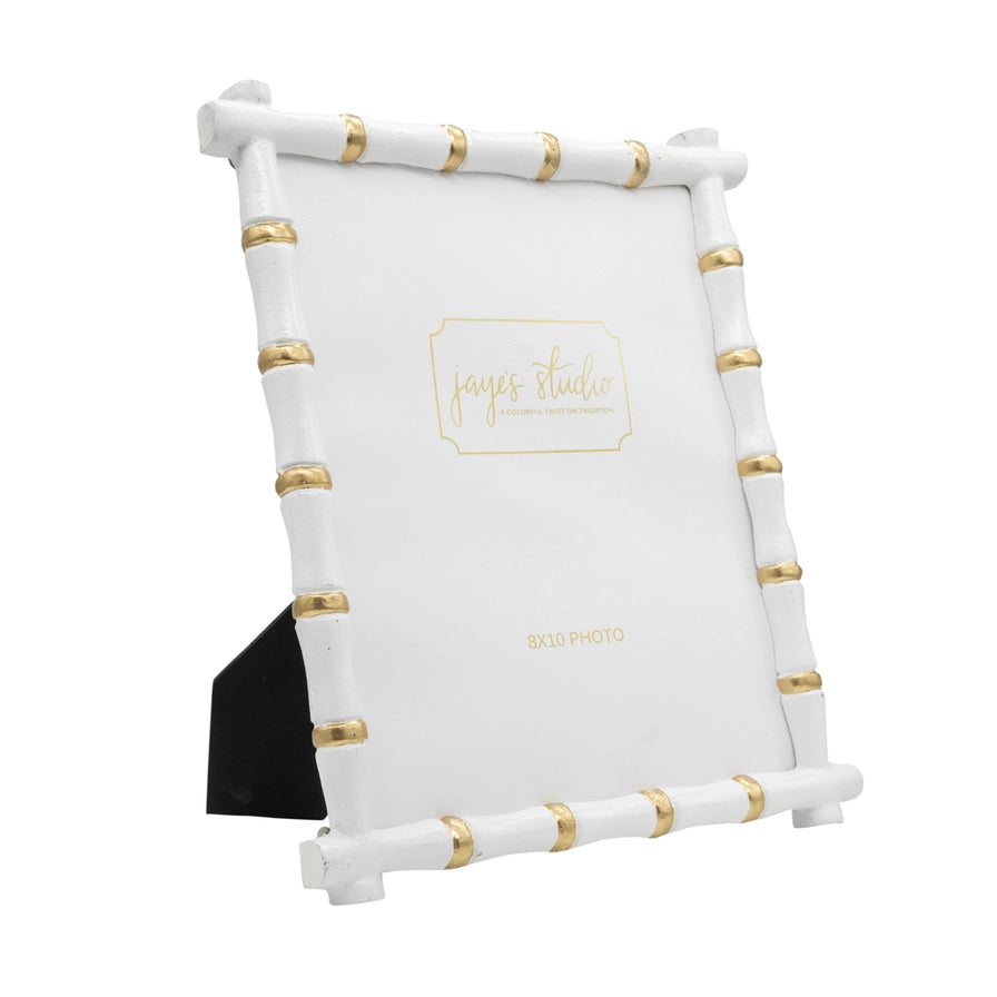 White photo prop with gold accents and 'Joye Studio' branding on a white background
