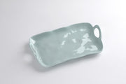 Light blue melamine tray with a handle on a white background - Pampa Bay 