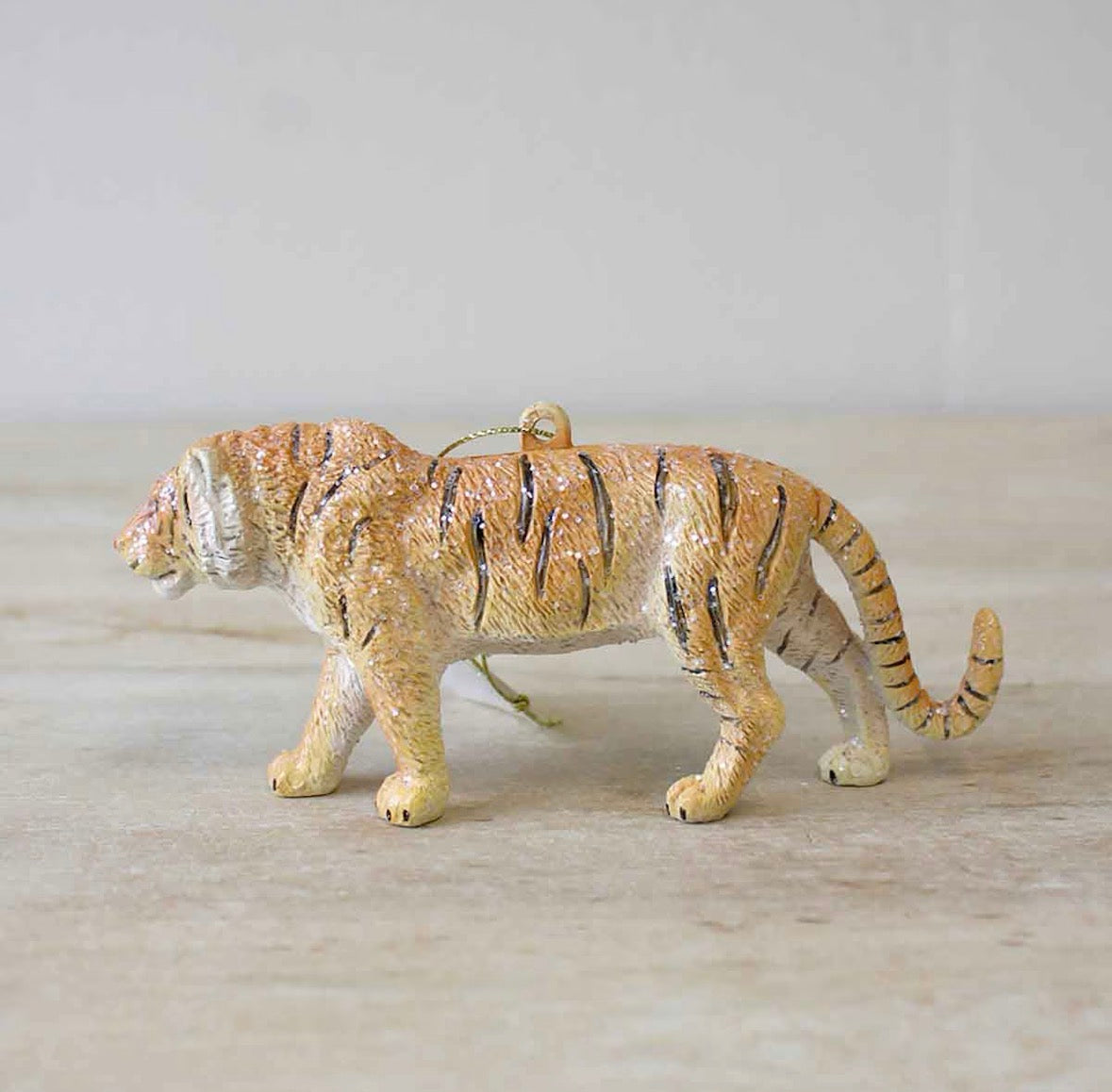 Tiger Christmas Ornament on Wooden Table