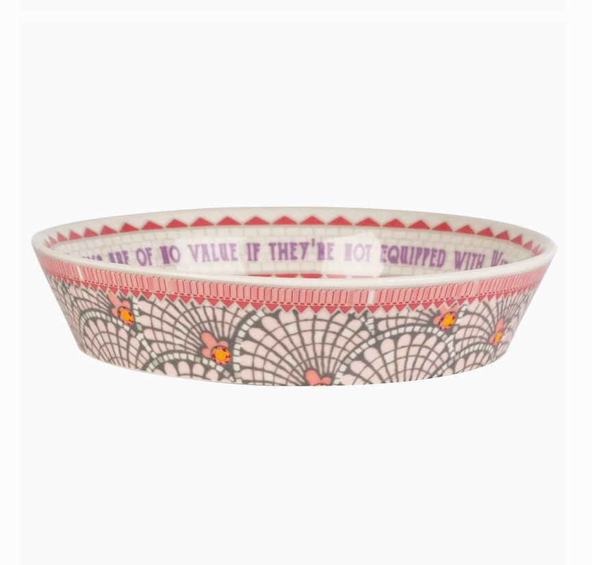 Decorative bowl with spider web pattern and text on a white background