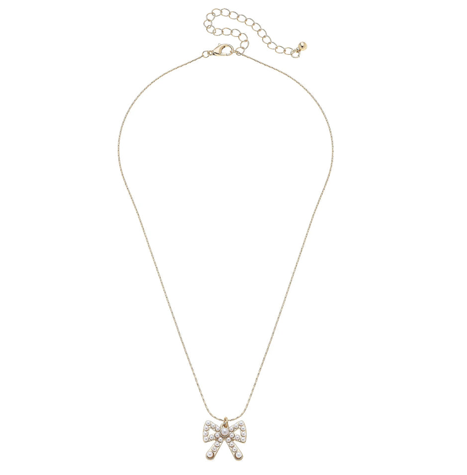 Necklace with a bow-shaped pendant on a white background