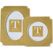 Two gold picture frames with a logo on a white background- Two’s Company 