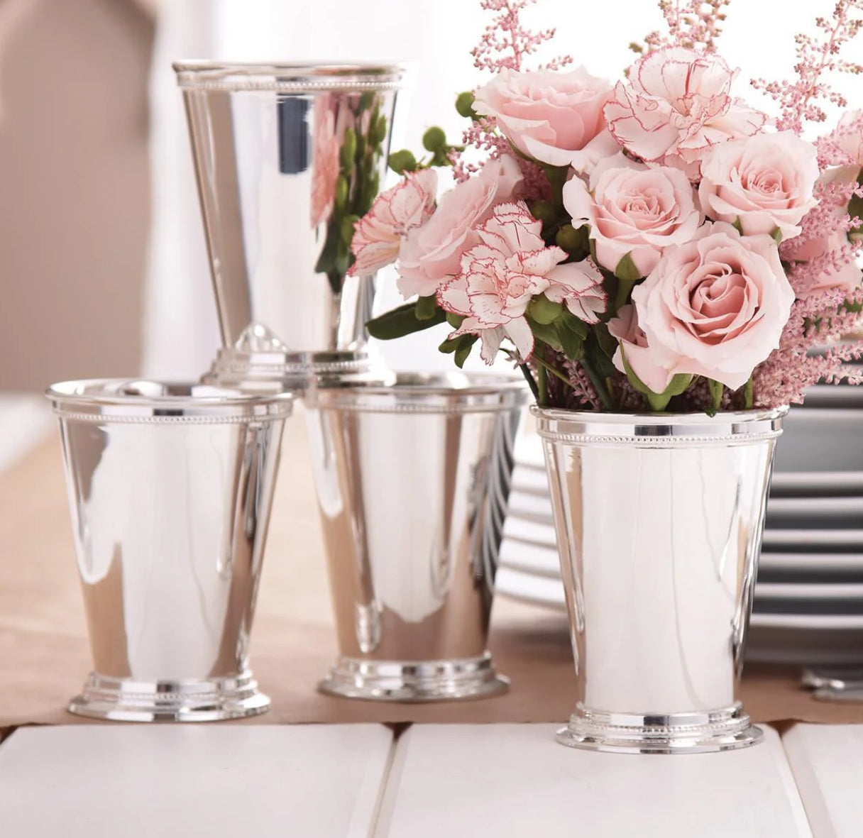 Cups - Mint Julip - Set/4 - silver sups on a table with pink roses in one of the cups 