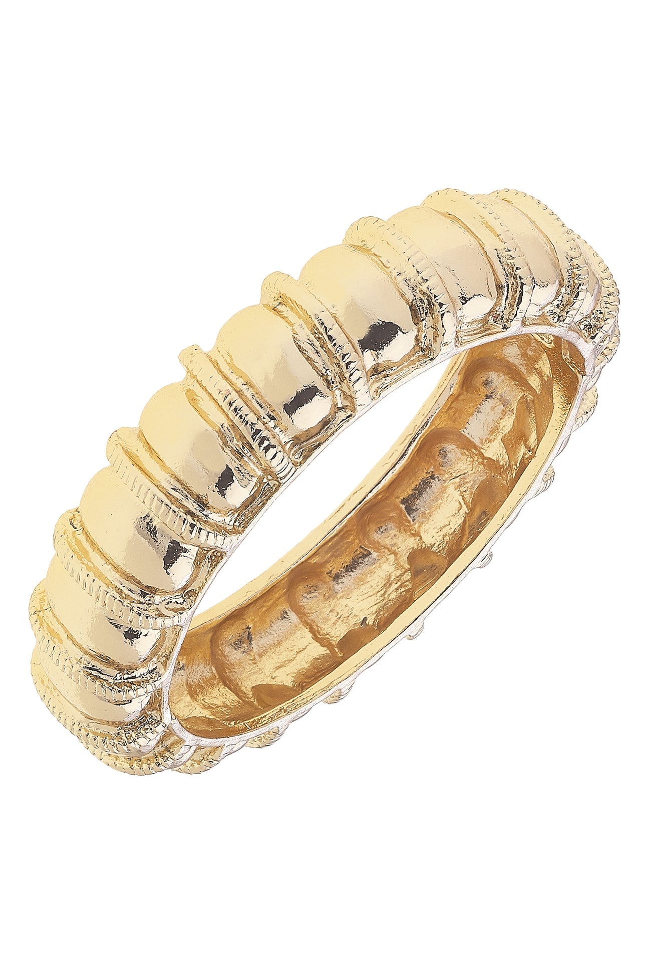 Gold ring with textured band on a white background