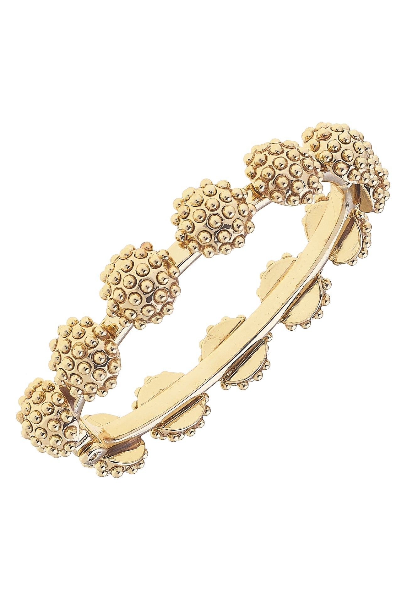 Gold bracelet with textured design on a white background