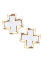 Pair of cross-shaped earrings with gold and white design on a white background