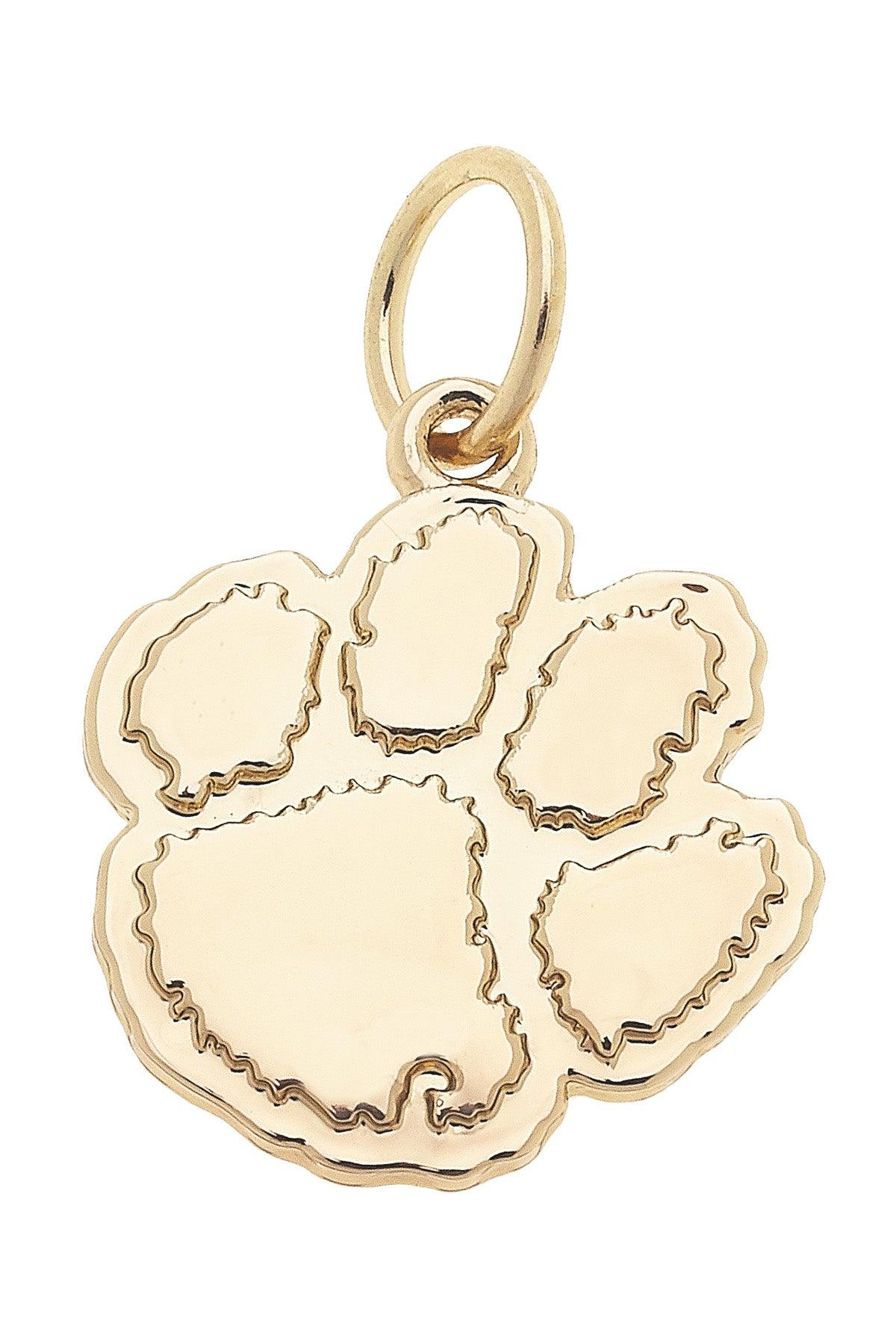 Gold paw print pendant on a white background