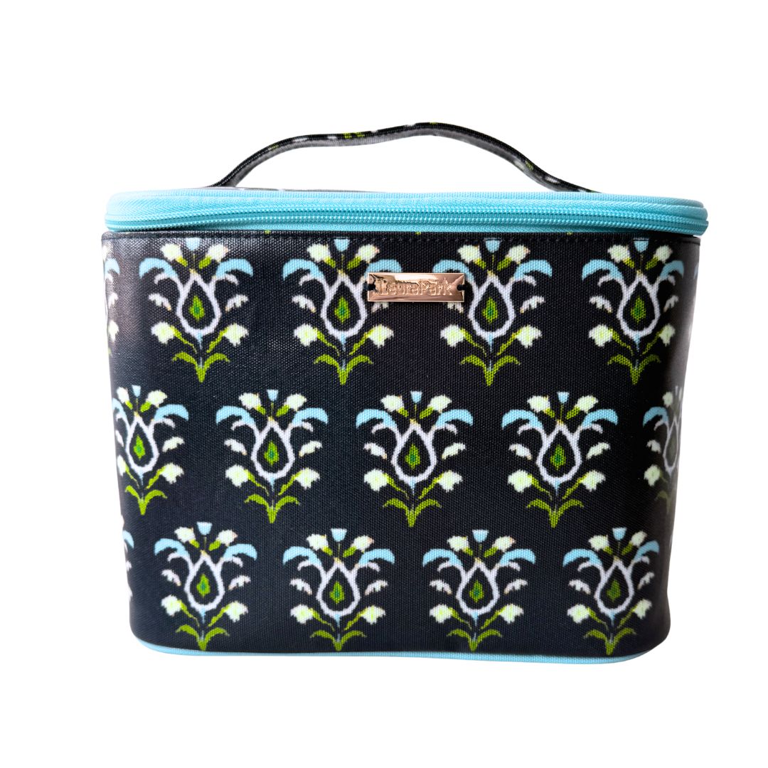 Laura Park Cosmetic bag with floral pattern and blue zipper on a white background