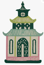 Decorative rug with a pagoda design on a white background