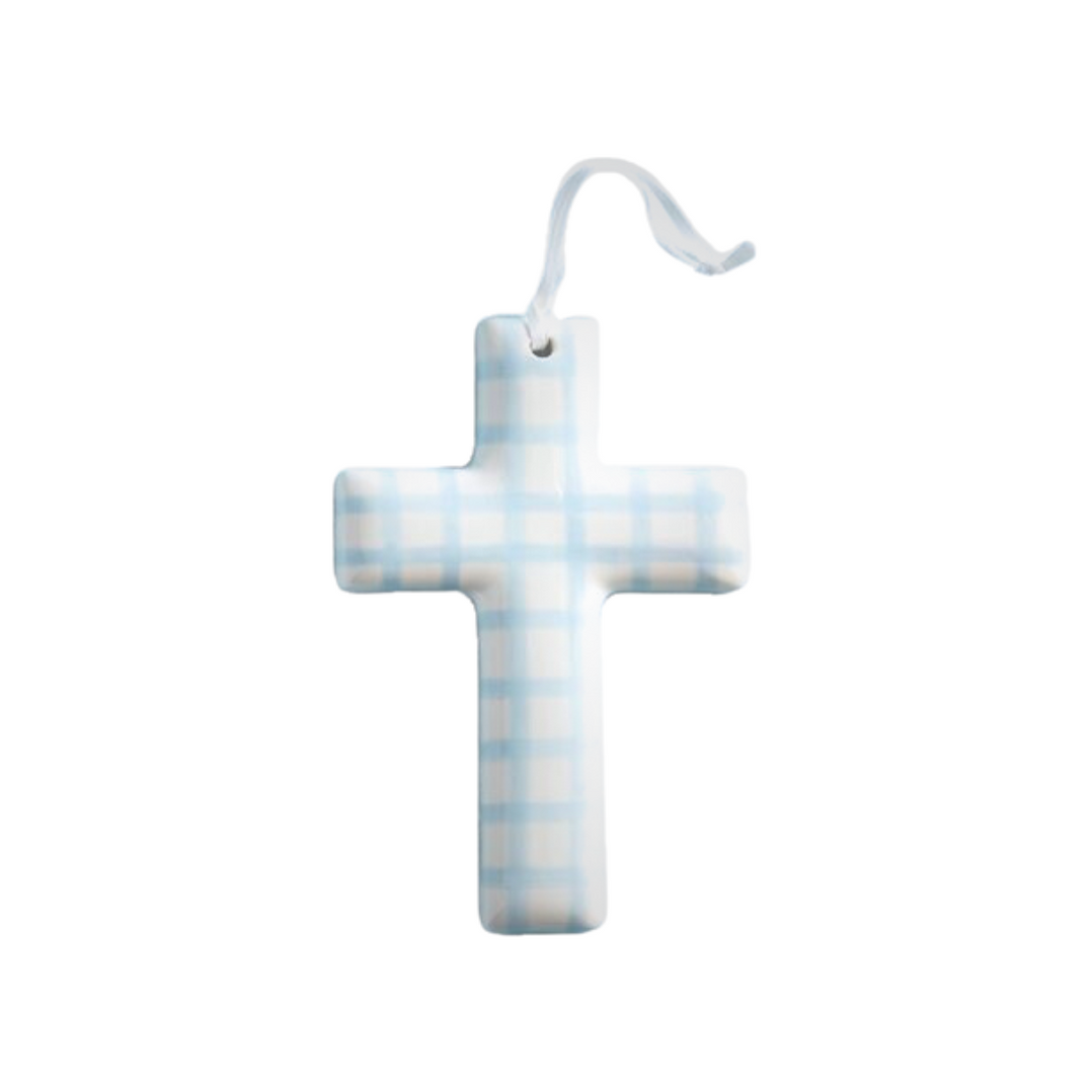 Cross-shaped hanging ornament with blue and white checkered pattern on a white background