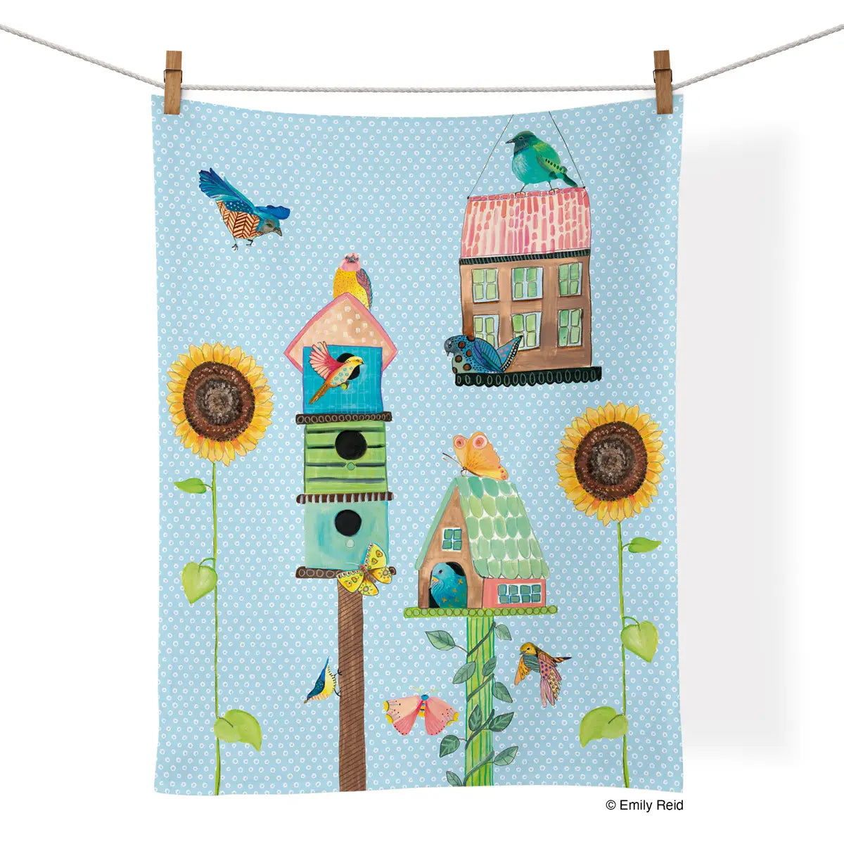 Tea Towel - Birdhouse Lane- picture is of a baby blue tea towel and design is of sunflowers and bird houses and a bird, the towel is hanging on a clothes line