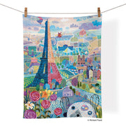 Tea Towel - Paris- this picture is of a colorful design of Paris and the tea towel is hanging on a clothes line 