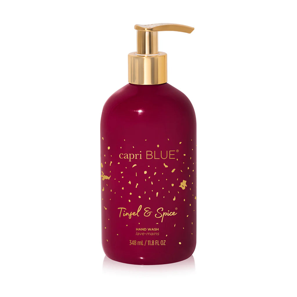 Seasonal - Hand Wash - Tinsel & Spice in a red pump container with a gold pump 