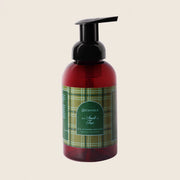 Hand soap on a beige background 