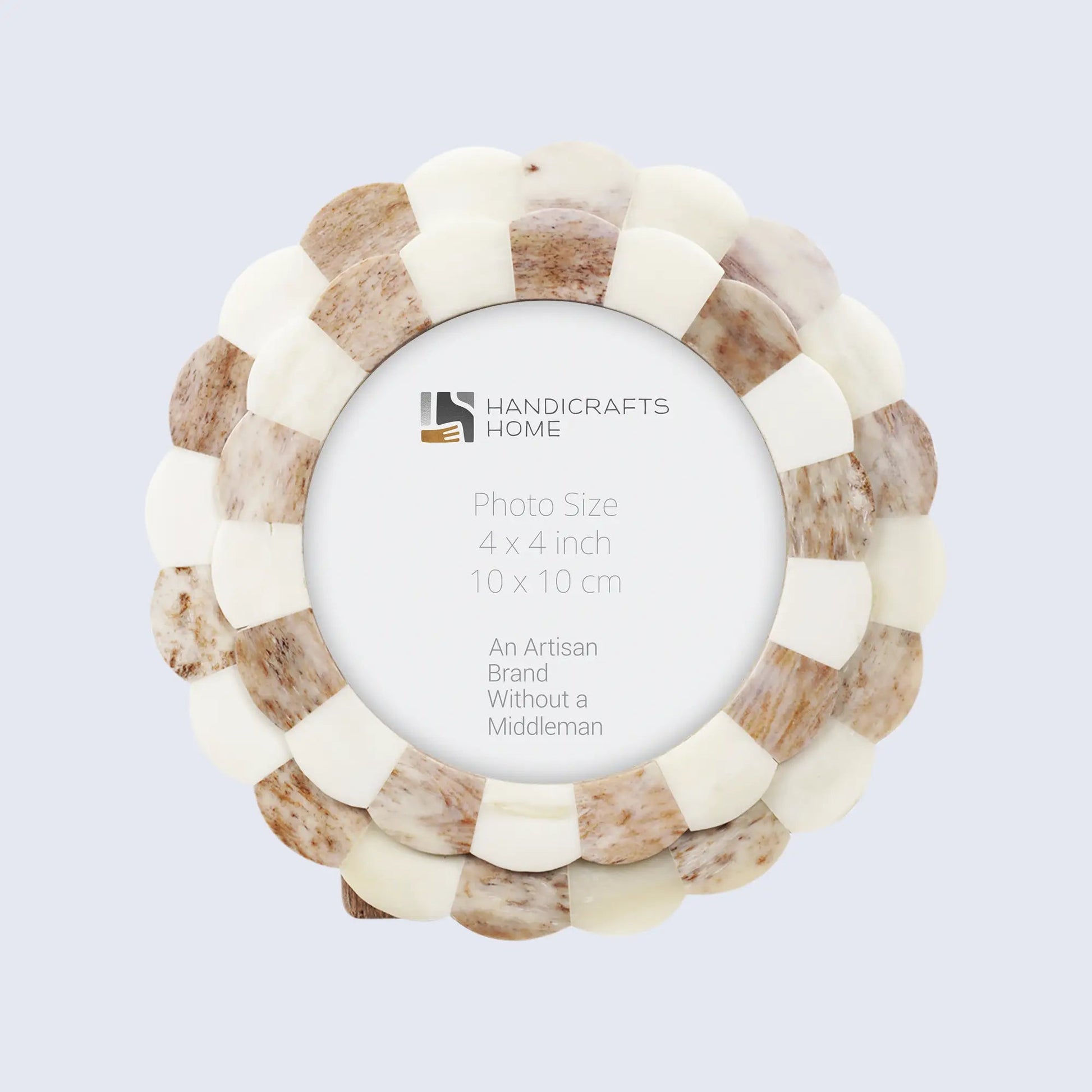 Round photo frame with natural wood and bone design on a light gray background