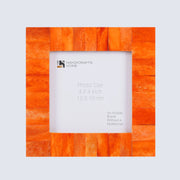 Orange photo frame with 'Handicrafts Home' branding on a light gray background
