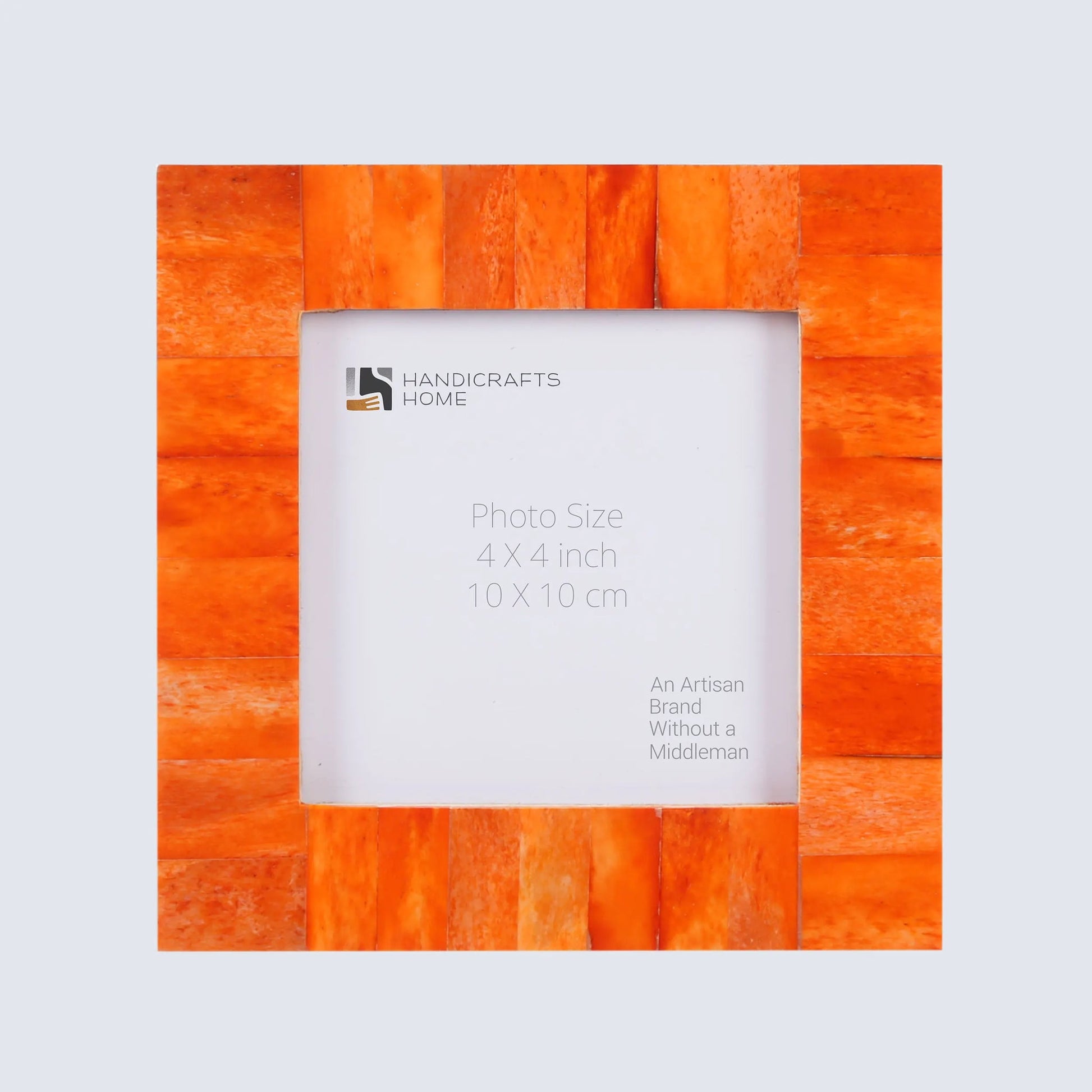 Orange photo frame with 'Handicrafts Home' branding on a light gray background