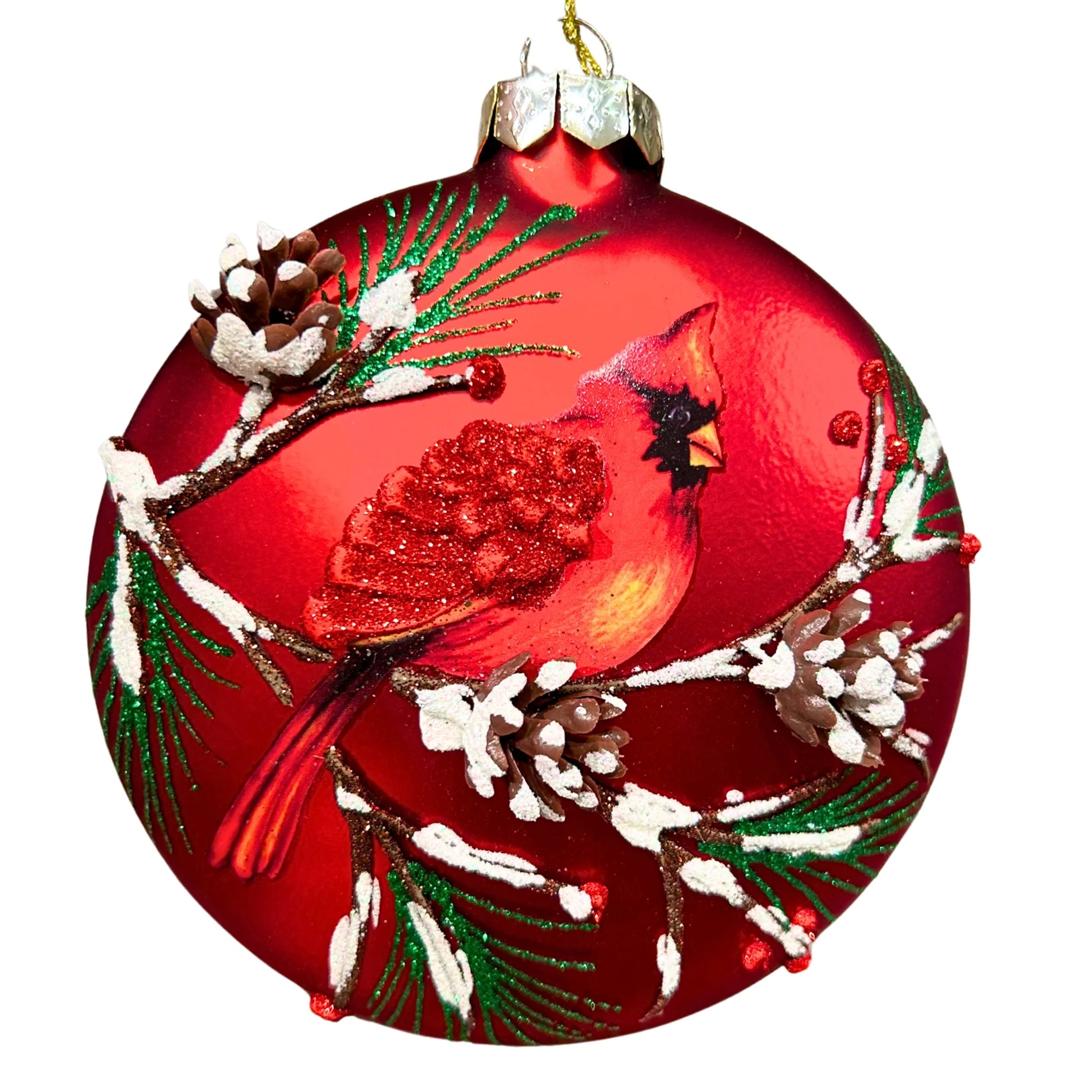 Red glass ornament with a cardinal design on a white background