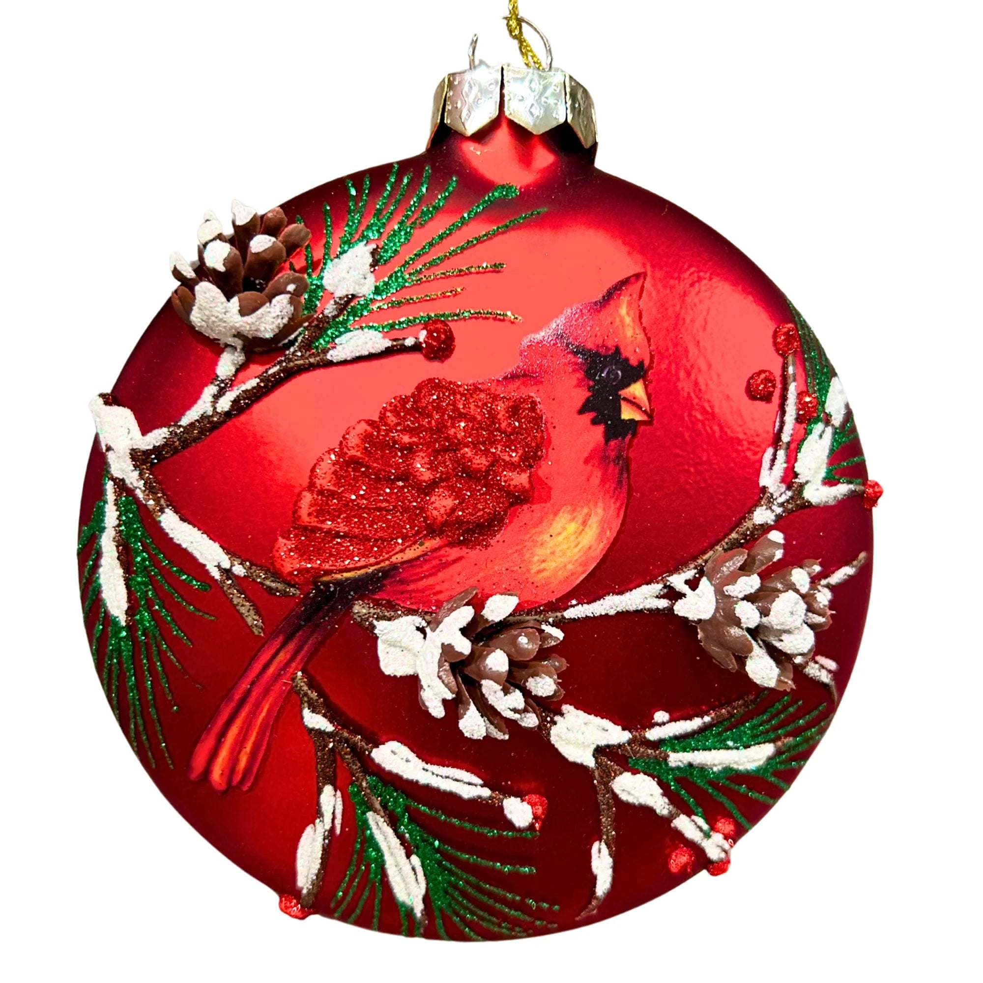 Red glass ornament with a cardinal design on a white background