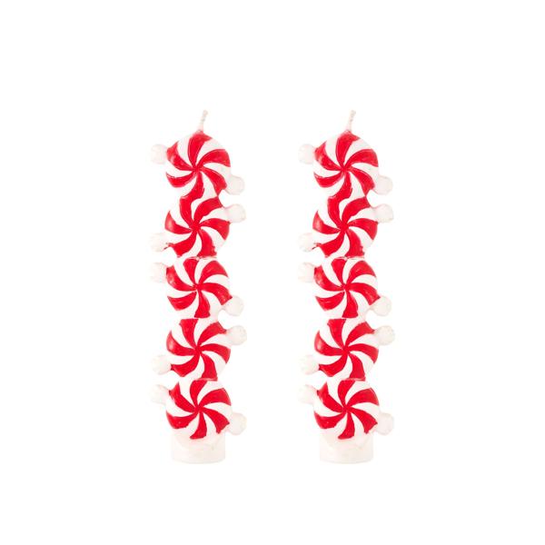 Two red and white candy cane-shaped candles on a white background