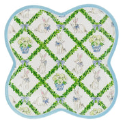 Decorative platter with bunny and flower pattern on a white background