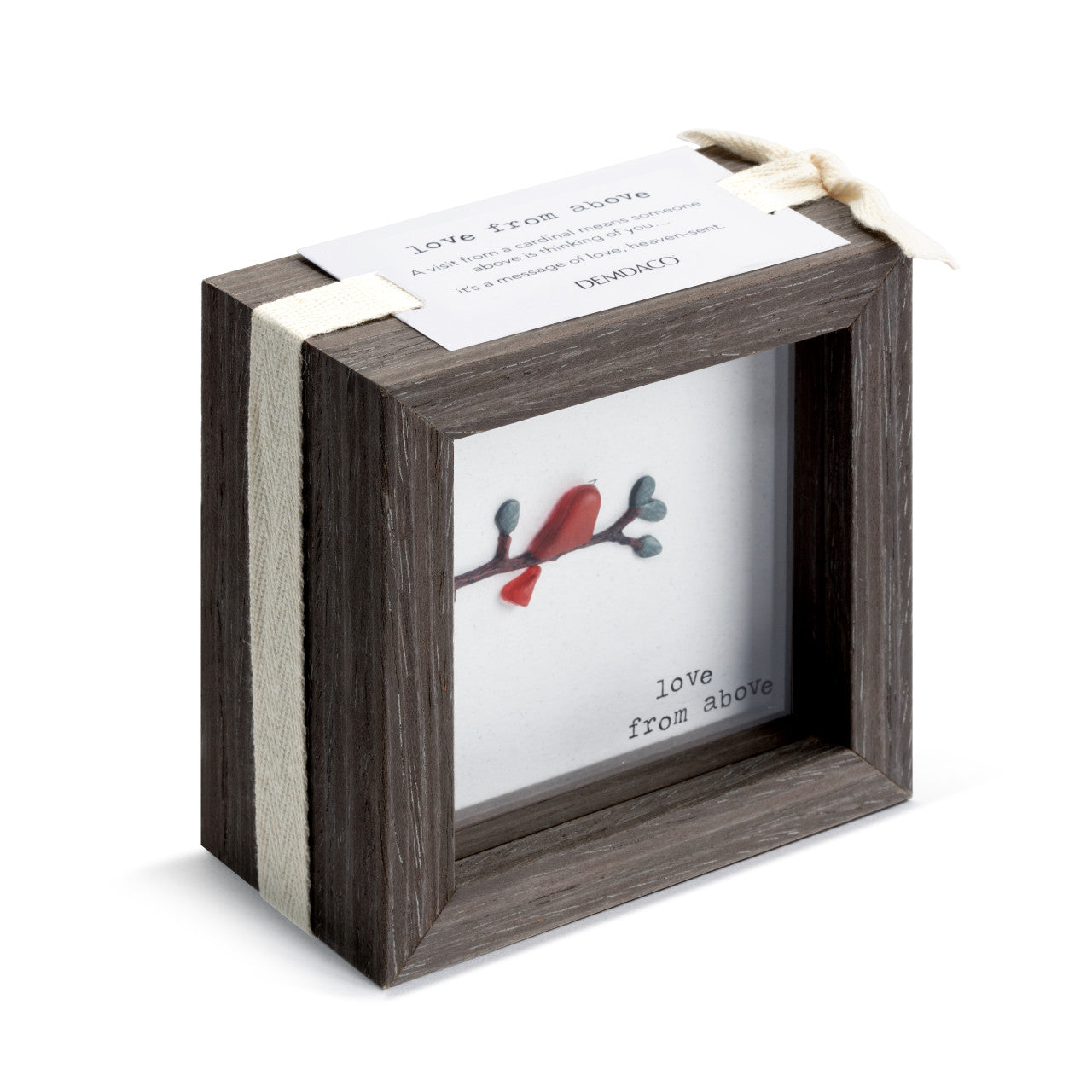 Wooden box with a small picture of a bird on a branch inside, on a white background.