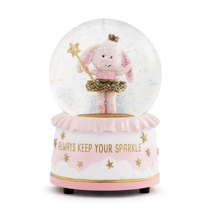 Decorative snow globe with a pink character holding a wand, surrounded by stars and clouds, on a white background.