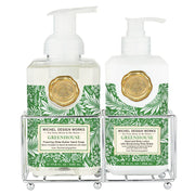 Two bottles of Michel Design Works Greenhouse hand soap in a decorative stand on a white background.